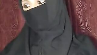 Muslim housewife in burqa posing naked